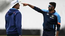 Ravichandran Ashwin of India speaks with coach Ravi Shastri