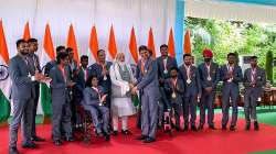 PM Modi hosts India Paralympic contingent, presented with autographed stole