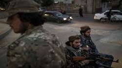 Taliban fighters ride in the back of a pickup truck as patrol the streets of Kabul, Afghanistan. (Representational image)