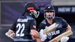 New Zealand's Daryl Mitchell, right, and New captain Kane Williamson run between wickets during the Cricket Twenty20 World Cup match between New Zealand and India in Dubai, UAE, Sunday, Oct. 31, 2021.?