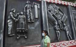  A community puja pandal depicting coronavirus pandemic ahead of Durga Puja festival, in Kolkata