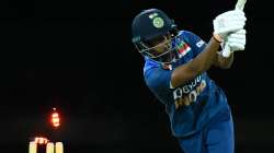 ?Pooja Vastrakar of India is dismissed by Nicola Carey of Australia during game three of the International Women's T20 series between Australia and India at Metricon Stadium on October 10, 2021 in Gold Coast, Australia.