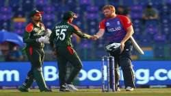 Jonny Bairstow of England shakes hands with Nurul Hasan and Mahedi Hasan of Bangladesh following the ICC Men's T20 World Cup match between England and Bangladesh at Sheikh Zayed stadium on October 27, 2021 in Abu Dhabi, United Arab Emirates. (Photo by Francois Nel/Getty Images)