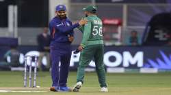 Indias captain Virat Kohli, left, and Pakistans captain Babar Azam greet each other at the Twenty20 World Cup match between India and Pakistan in Dubai, UAE, Sunday, Oct. 24, 2021.