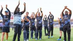 Namibian players gesture to the crowd after qualifying for T20 World Cup Super 12 stage in Sharjah o