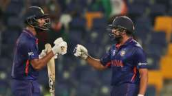 India's KL Rahul, left, and India's Rohit Sharma celebrate scoring runs during the Cricket Twenty20 