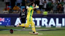 Australia's highest scorer with 77 runs Mitchell Marsh celebrates after his teammate Glenn Maxwell h