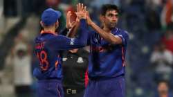 India's Ravichandran Ashwin, right, celebrates the dismissal of Afghanistan's Najibullah Zadran with