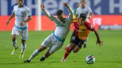 Jamshedpur FC's Ishan Pandita (in white) vies for the ball with East Bengal's Sourav Das during Indi