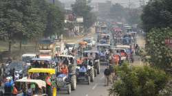 Farmers participate in a tractor rally organized by BJP Kisan Morcha from Lal Bahadur Shastri Airport, in Varanasi, Sunday, Nov. 28, 2021.