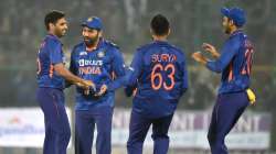 Bhuvneshwar Kumar of India celebrates the wicket of Daryl Mitchell of New Zealand (not pictured) wit