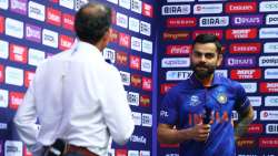 Virat Kohli of India looks on as they are interviewed following the ICC Men's T20 World Cup match be