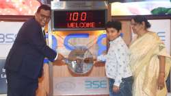 Paytm founder and CEO Vijay Shekhar Sharma with his mother and son hammers a gong to mark the listing of Paytm shares at the BSE on Nov 18.