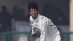 New Zealand's Rachin Ravindra bowls during Day 2 of their 1st Test match with India in Kanpur, India