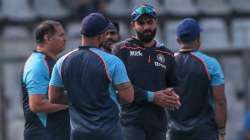 India's Ravindra Jadeja speak with team members before the start of the Day 1 of 2nd Test match agai