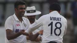  India's Ravichandran Ashwin (left) share a light moment with Virat Kohli during day three of the se