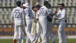 India's cricketers celebrate after winning on the day four of their second test cricket match with N