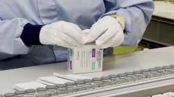 AstraZeneca, a worker packages the company's Evusheld medication.