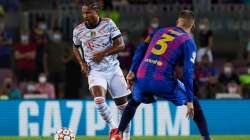 File photo of Bayern Munich's Serge Gnabry (in white) with Barcelona's Gerard Pique.