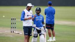 India pacer Ishant Sharma (left) talks with the team's captain Virat Kohli during a training session