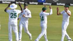 South Africa team celebrates after taking the wicket of Indian batsman in the first Test. 