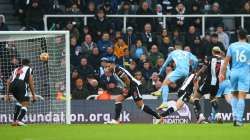 Manchester City's Joao Cancelo (third from left) scores the team's second goal during the Premier Le