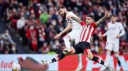 Real Madrid striker Karim Benzema (far left) scores his team's second goal against Athletic Bilbao d