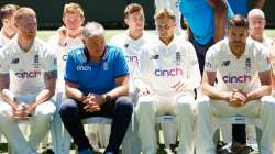  England head coach Chris Silverwood speaks to Joe Root of England before posing for a team photo du