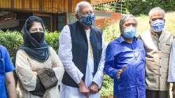 NC leader Farooq Abdullah and PDP chief Mehbooba Mufti with other members during a media address after a meeting of Peoples Alliance for Gupkar Declaration (PAGD) in Srinagar on June 22, 2021.