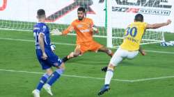 Kerala Blasters' Jorge Pereyra Diaz (in yellow) scores the team's opening goal against Chennaiyin FC