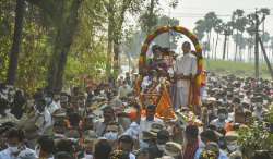 CJI NV Ramana takes bullock cart ride during a visit to native village in Andhra | VIDEO