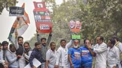 Indian Youth Congress activists protest against the central government over the rising inflation in New Delhi on Dec 1.