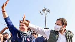 Congress leaders Rahul Gandhi and Priyanka Gandhi Vadra wave at supporters as they take part in the Manhgai Hatao, BJP Bhagao Pratigya Padyatara, in Amethi.