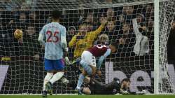 Aston Villa's Philippe Coutinho (centre) scores his side's second goal during the English Premier Le