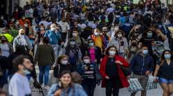 People wearing face masks to protect against the spread of coronavirus walk in downtown Madrid, on March 31, 2021. (Representational image)