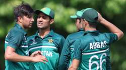 Pakistan U19 players celebrate after taking a wicket during a game in U19 World Cup 2022