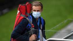 England captain Joe Root wears a protective mask as he walks to nets during a England Nets Session.