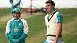 File Photo of Australia head coach Justin Langer with Test skipper Pat Cummins.