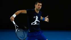 Novak Djokovic of Serbia plays a backhand during a practice session.