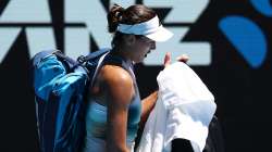 Garbine Muguruza of Spain looks dejected after losing her match against Alize Cornet of France.