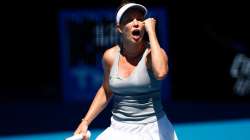 Danielle Collins exults after winning a point against Alize Cornet at the Australian Open in Melbour