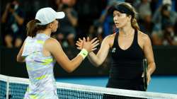 Danielle Collins of United States shakes hands with Iga Swiatek of Poland after winning the Women's 