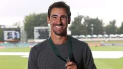 Mitchell Starc poses with the Allan Border Medal at Manuka Oval. (File photo)