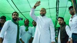 Muzaffarnagar: AIMIM Chief Asaduddin Owaisi waves towards supporters during a public meeting, in Muzaffarnagar, Wednesday, Oct. 27, 2021. 