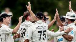 New Zealand players celebrate after taking a wicket against South Africa in the 1st Test