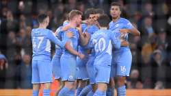 Kevin De Bruyne of Manchester City celebrates with teammates after scoring their side's second goal.