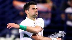 Novak Djokovic of Serbia looks on against Lorenzo Musetti of Italy.