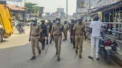 Policemen patrol on a road as Section 144 has been imposed by the authorities to prevent any violence in Shivamogga.