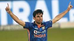 Indian bowler Ravi Bishnoi celebrates the wicket of West Indian batsman Rovman Powell during the fir