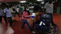 An Indian student, part of a batch of 250 Indian nationals evacuated from Ukraine, leaves the Chhatrapati Shivaji Maharaj International Airport in Mumbai.